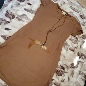 Tan dress with feather accent piece